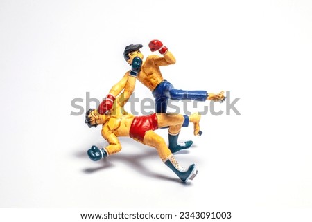 boxer fighting toy on white background