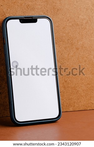 Mobile Phone isolated mockup with white screen isolated on white background on high-quality studio shot