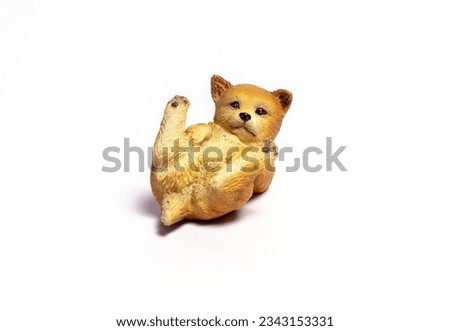 brown dog toy on white background