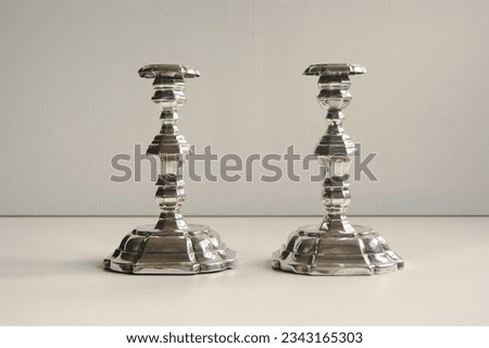 Pair of baroque silver candle holder. 18th century. Royalty-Free Stock Photo #2343165303