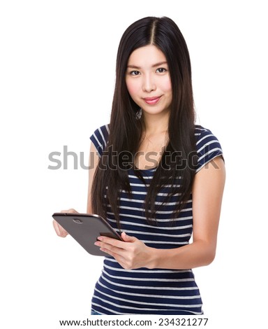 Asian Woman use of tablet