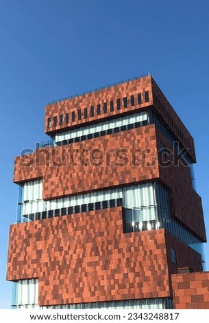 Southern façade of the MAS museum in the harbour of Antwerp, Belgium Royalty-Free Stock Photo #2343248817