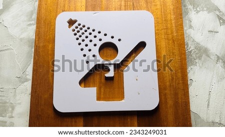 Symbol stuck in the bathroom