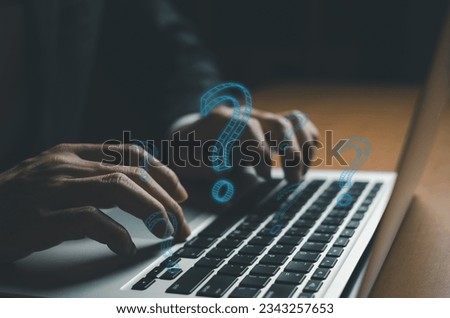 Selective focus at men hand while typing keyboard for asking question from online customer service support. FAQ, question that client ask from after sale service team. 