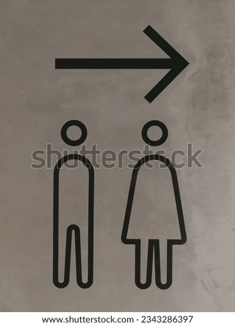 Sign for men's and women's restrooms.