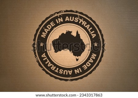 Brown paper with in its middle a retro style stamp Made in Australia include the map of Australia.