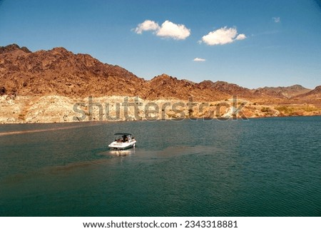 Water ski boat on a lake with a low water line at Lake Mead Nevada in August 2005 Royalty-Free Stock Photo #2343318881