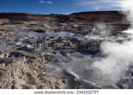 Stunning geothermic field of Sol de Mañana with its steaming geysers and hot pools with bubbling mud - just one sight on the lagoon route in Bolivia
