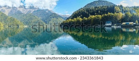 Panorama of a natural lake high in the mountains