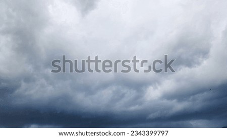 Majestic clouds float gracefully across boundless sky, their elegant forms painting a mesmerizing canvas of beauty and majesty. Because of their ever-changing shapes and sizes, clouds are beautiful. Royalty-Free Stock Photo #2343399797