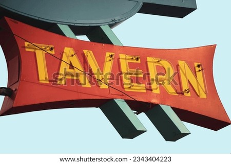 Aged and worn retro neon tavern sign