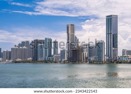 Soaring residential upscale condominiums at Edgewater district of Miami facing the Biscayne Bay. Missoni Baia and Elysee are the tallest buildings in the cluster.