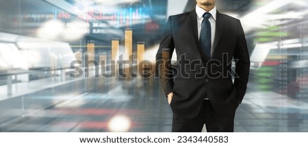 Handsome  businessman in swanky modern stylish suit plan graph growth and increase of chart positive indicators in his business