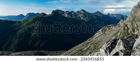 Horizontal high resolution panorama of green luscious details in Norwegian mountains seen from Smaltinden, Luröy, Helgeland, Nordnorge. Green mountains. Hills of norway. Nordic coastline High contrast