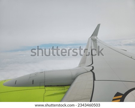 This picture shows the wing of an airplane while it was flying.