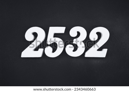 Black for the background. The number 2532 is made of white painted wood.