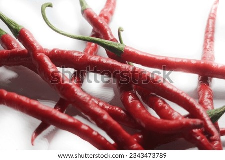 Red chili pepper isolated on white background as a package design element