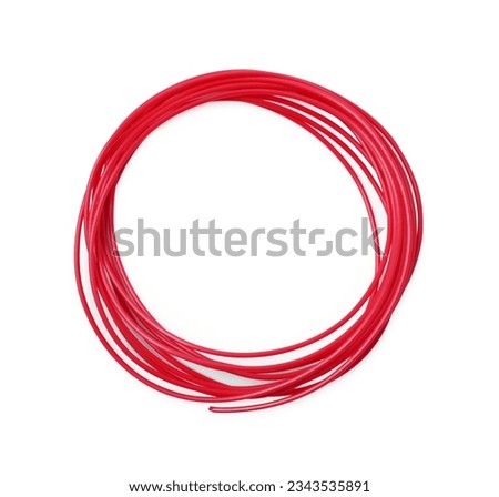 Red plastic filament for 3D pen on white background, top view