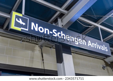 Sign at the arrivals hall of a European airport, advising that this is the entrance for non-schengen arrivals.