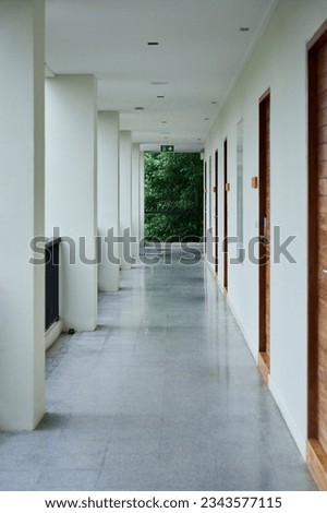   empty corridor of a hotel room                              