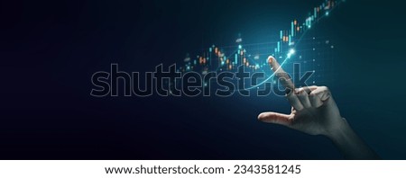 Stock graph and financial chart. Analyze stock market finance volume of stock market with Graph and chart holograph technology. High quality photo Royalty-Free Stock Photo #2343581245