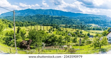 A panorama view over the hillside below the town of Radovljica, Slovenia in summertime Royalty-Free Stock Photo #2343590979