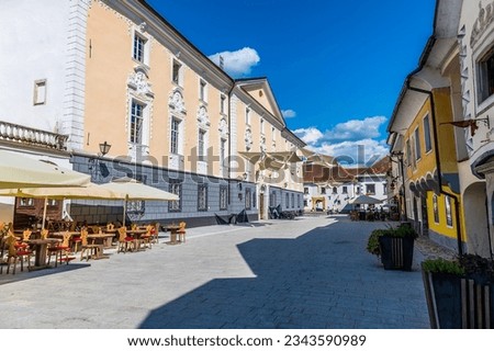 A view down the main street in the old town of Radovljica, Slovenia in summertime Royalty-Free Stock Photo #2343590989