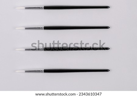 a little paintbrush isolated on a white background
