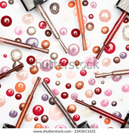 Nail polish brushes and dots in many colors