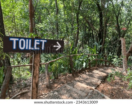 Toilet plank information in forest