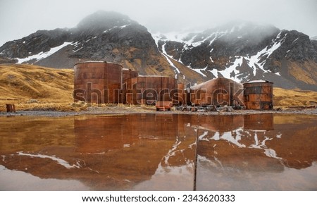 Jetty and shipwrecked Albatross; Whale oil tank reflections on wet steel plate; White tank reflections; Grytviken, South Georgia