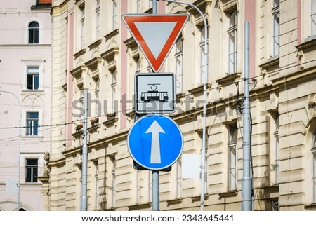 Traffic signs, trams, yield sign, one way road