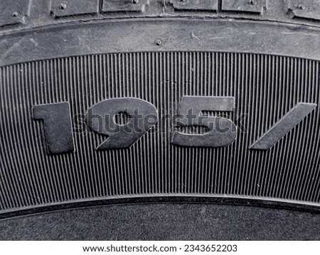 Embossed texture of the tire size of a car