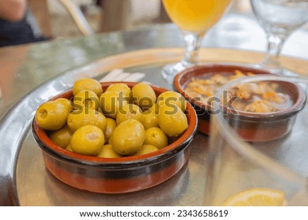 meal, olives, snails, salad, sausage, aperitive, outdoor, comestible, food Royalty-Free Stock Photo #2343658619