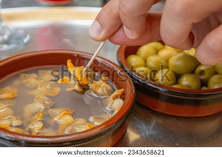 meal, olives, snails, salad, sausage, aperitive, outdoor, comestible, food Royalty-Free Stock Photo #2343658621
