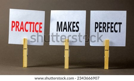 Practice makes perfect symbol. Concept words Practice makes perfect on beautiful white paper on clothespin. Beautiful grey background. Business practice makes perfect concept. Copy space.