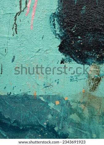 Abstract scratched light blue paint on a concrete wall for background or texture