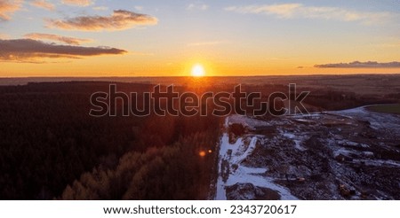 Sunset on a snowy day, aerial photo