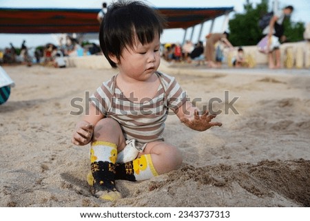 Children are playing with sand.