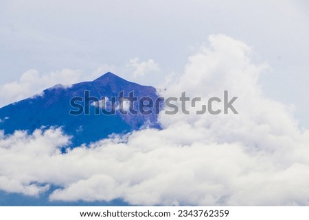 Mount Kerinci (Gunung Kerinci) is the highest mountain in Sumatra, the highest volcano and the highest peak in Indonesia with an altitude of 3805 masl, located in the Kerinci Seblat National Park area Royalty-Free Stock Photo #2343762359
