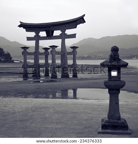 Colorized picture of floating gate O-Torii during low tide on Miyajima island in Japan