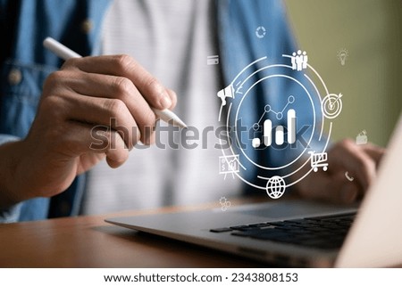 Entrepreneur type on keyboard for set business target with big data analytic for online marketing campaign that can increase sale revenue, reach to online marketplace customer. SEO concept