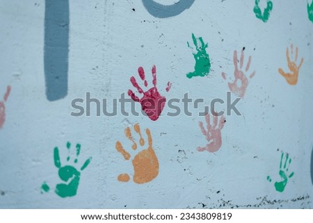 paint wall putting hands europe