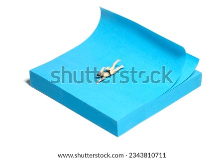 Creative miniature people toy figure photography. Sticky notes installation. A men swimming on the ocean with big waves. Isolated on white background. Image photo