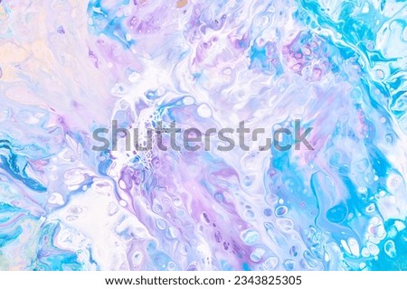 Exclusive beautiful pattern, abstract fluid art background. Flow of blending purple lilac blue paints mixing together. Blots and streaks of ink texture for print and design
