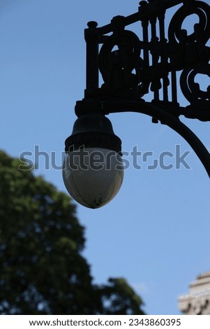 Decorative lamp in the park and blue sky