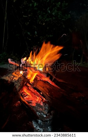 A scene of lighting a fire with chalkIn winter, everyone makes a fire by burning chalk. 
