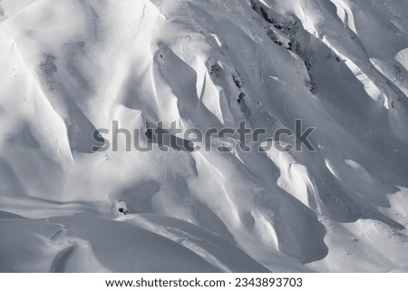 Mountains of Tirol covered in snow. Beautiful Winter Wonderland white peaks near Innsbruck. Avalanche Danger. Royalty-Free Stock Photo #2343893703