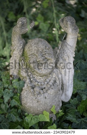 a statue of buddha, founder of the religion of buddhism Royalty-Free Stock Photo #2343902479