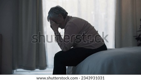 Stress, depression and sad old woman in bedroom with anxiety, mental health problem and debt in retirement. Lonely senior female person crying at home for headache, pain and fatigue of crisis in mind Royalty-Free Stock Photo #2343931031